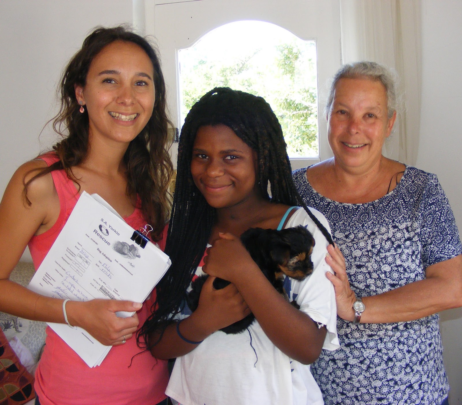 Angelique of SA Yorkie Rescue doing a home check and delivering a Yorkie puppy